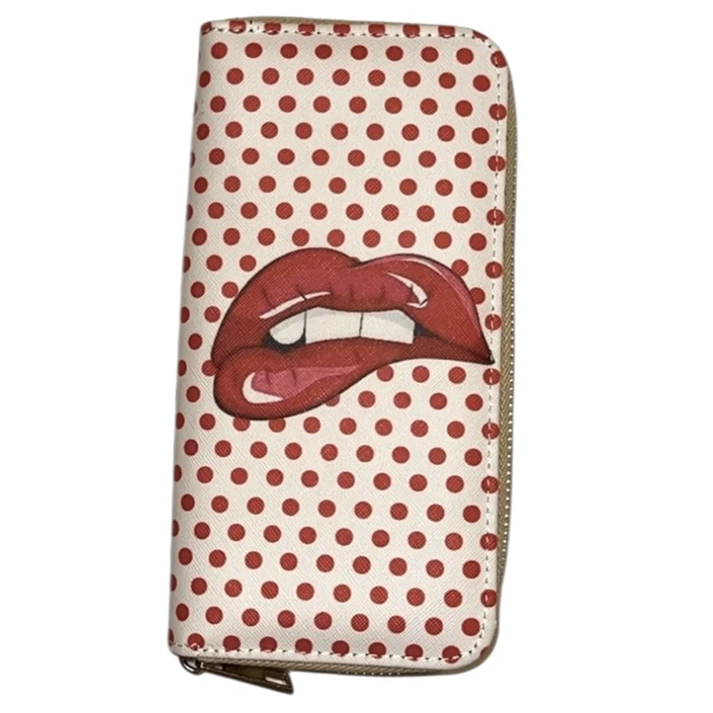 Red polka dot wallet zip around. Reminds me of Rolling Stones Album Cover. - Picture 1 of 8